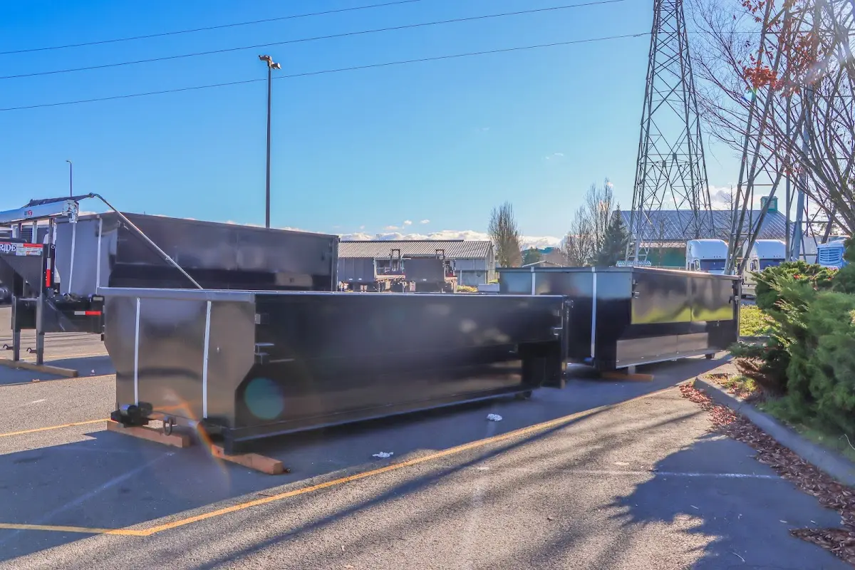 Roll-off dumpster ready for waste disposal at job site for 3 Yard Dumpster Rental in Kenwood